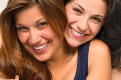 close-up-portrait-beautiful-girls-hugging-smiling-31567558